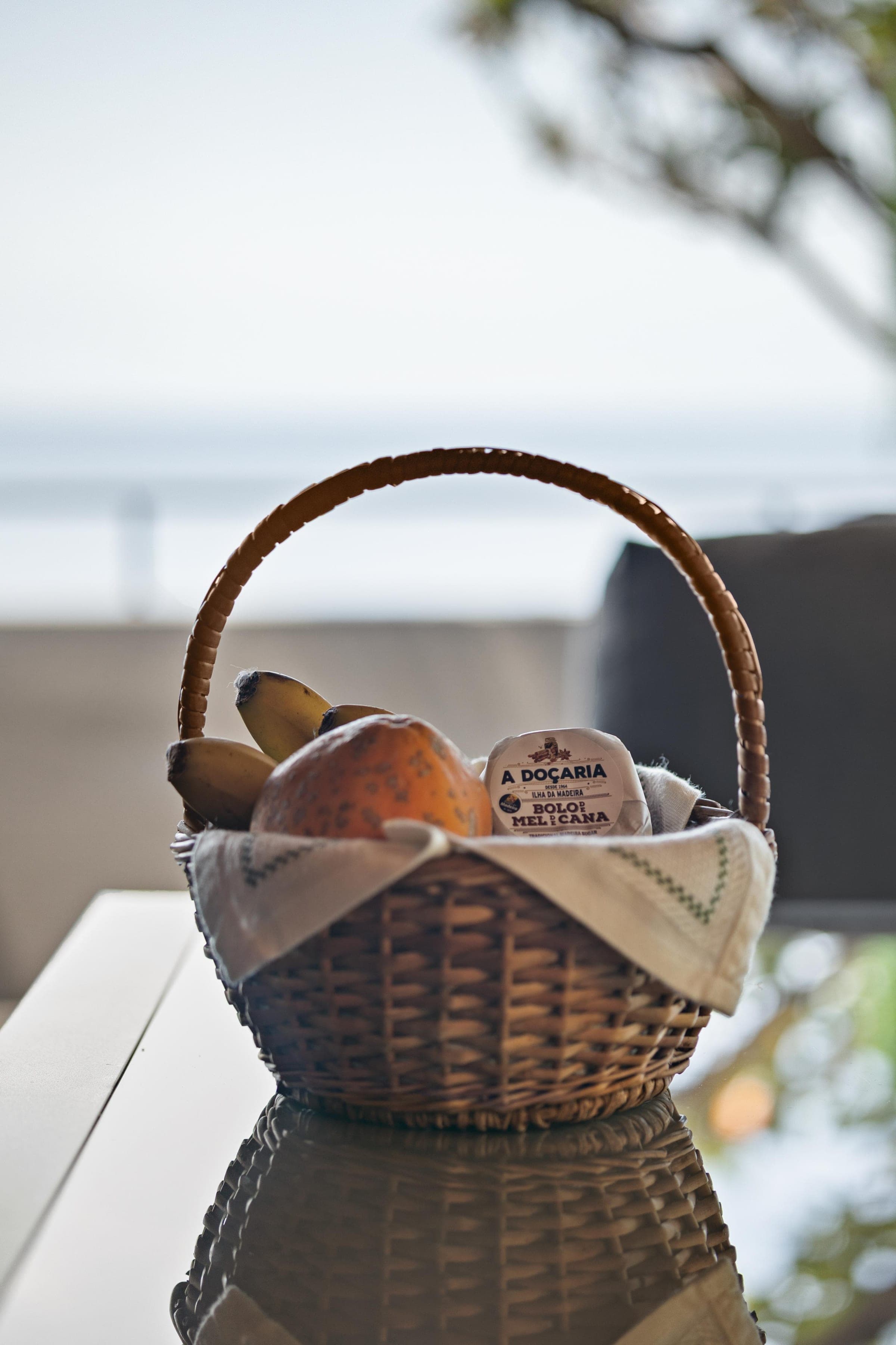 The welcome basket: bananas and papaya from the terraces, and Madeiran honey cake.